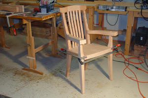 Wooden chair in a workshop setting.