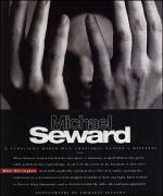 Book cover showing a grayscale photo of a person’s face partly obscured by their hands, with the title "Michael Seward" in large letters across the center.