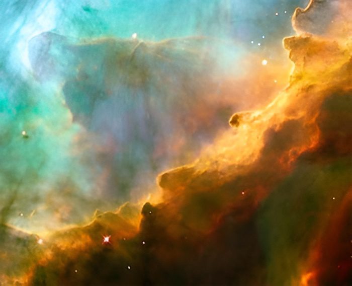 Colorful nebula with bright stars in space.