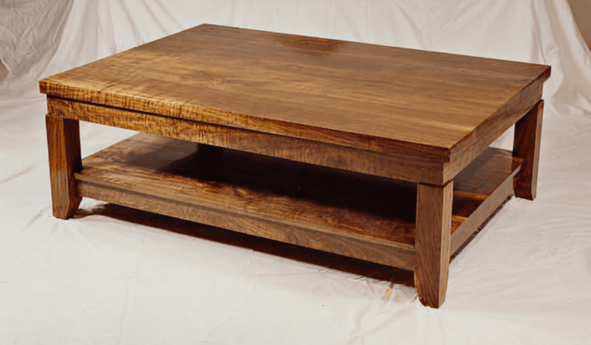 Wooden coffee table with lower shelf.